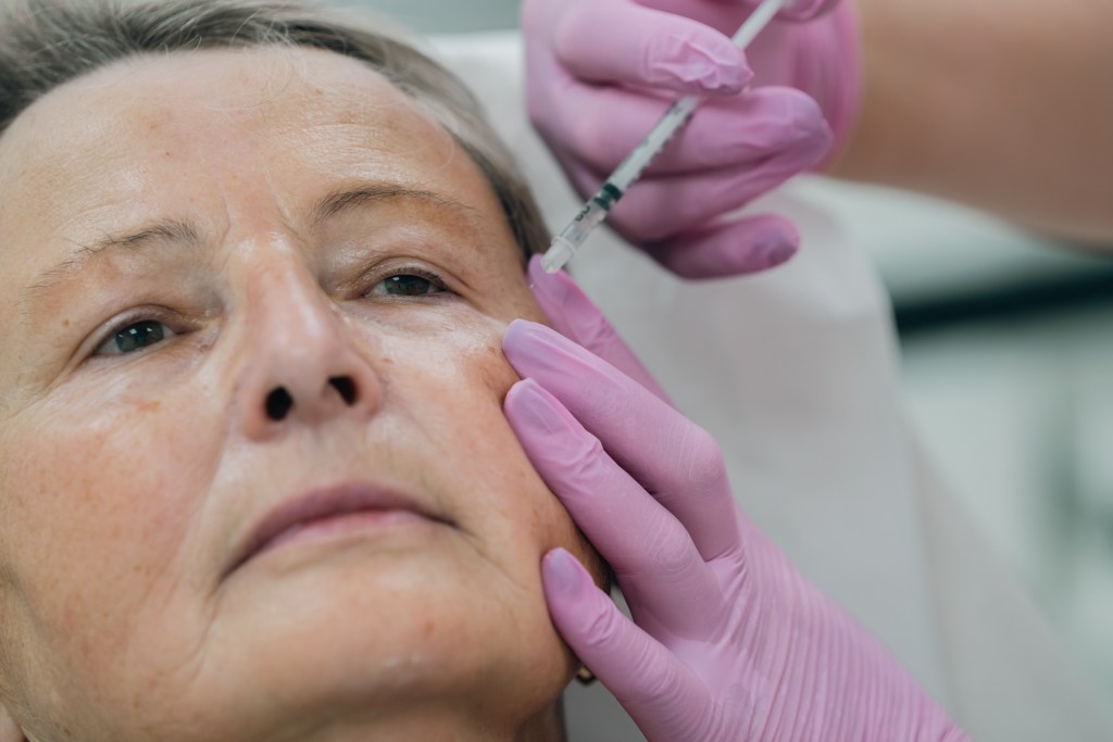 botox injection old woman